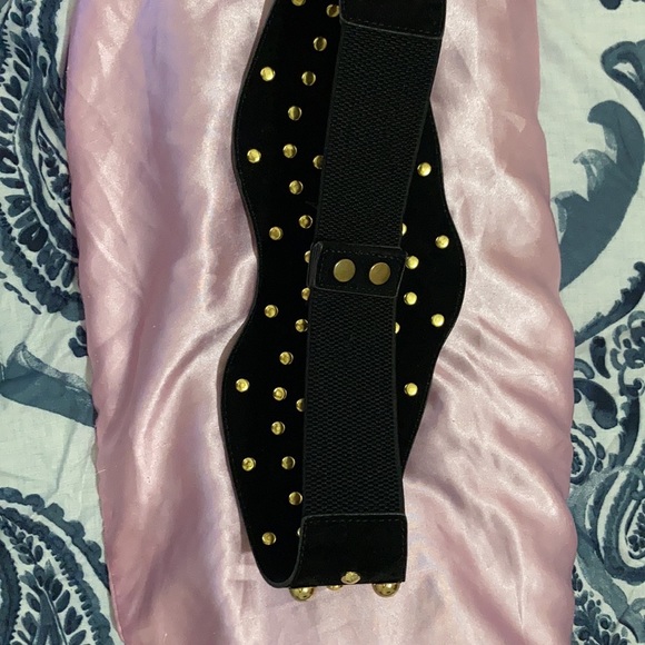 Leather/suede black belt with gold enhancements on front with 8” stretch back. - Picture 6 of 8